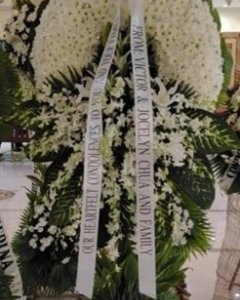 A Radiance white funeral Wreath