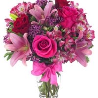 Asiatic lilies and wax-flower